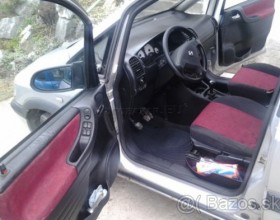 Opel ZAFIRA 1,8 16V, 92Kw, benzín + plyn LPG rv 10/2002 Posilňovač riadenia, ABS. Počet miest na sedenie 7, Airbag 10x, automatická klimatizácia, rádio/CD, multifunkčný kožení volant, centrálne uzamykanie, El. predné okná, El. zrkadlá, diaľkové ovládanie,